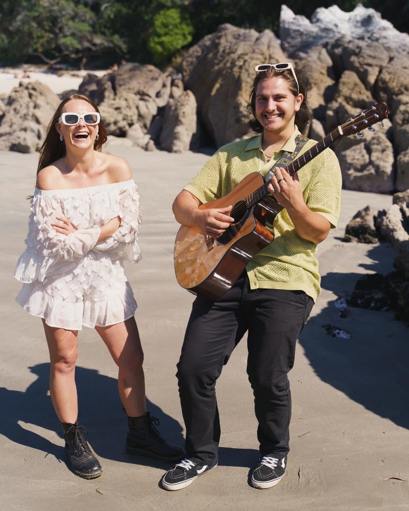 Electric Vibez duo performing on the beach